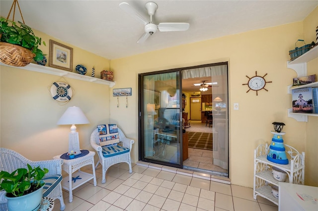 doorway to property with ceiling fan