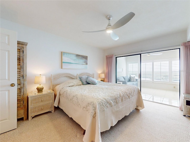 bedroom featuring a ceiling fan, access to outside, and light colored carpet