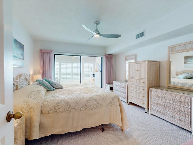 bedroom with a ceiling fan, visible vents, and carpet flooring