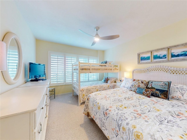 bedroom with light colored carpet and ceiling fan