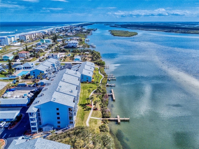 drone / aerial view with a water view