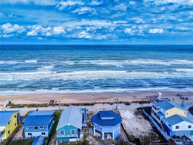 drone / aerial view with a view of the beach and a water view