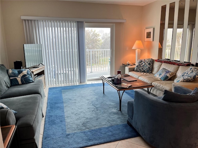 living room with light tile patterned flooring