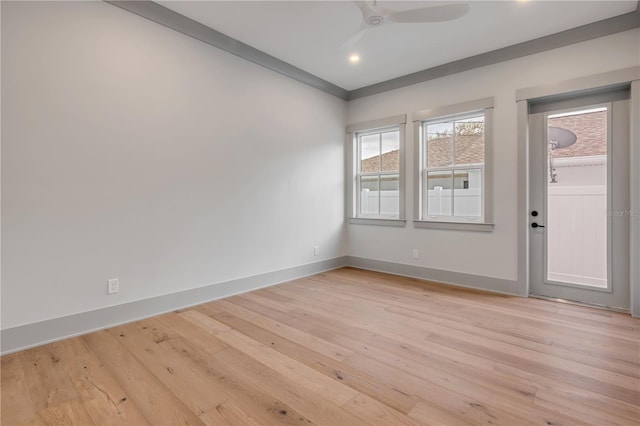 unfurnished room featuring light wood-style flooring, baseboards, a ceiling fan, and recessed lighting