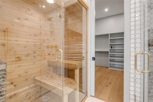 view of sauna featuring wood finished floors