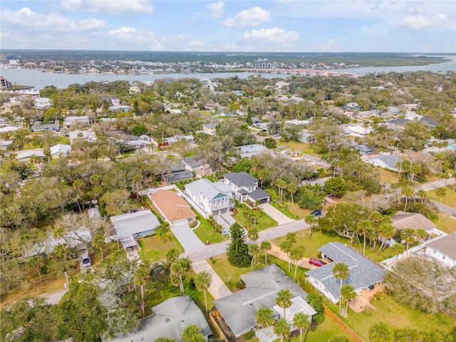 aerial view with a residential view and a water view