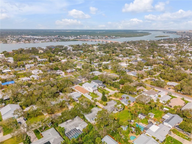 bird's eye view featuring a residential view and a water view