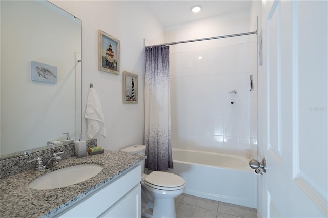 full bath featuring vanity, tile patterned flooring, toilet, and shower / tub combo with curtain