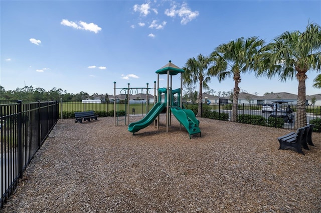 community jungle gym featuring fence