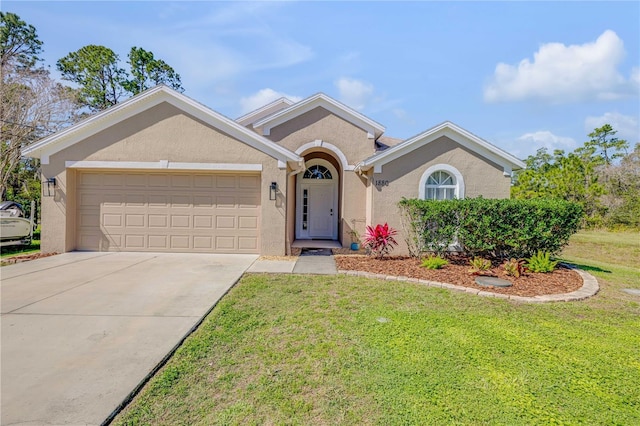 single story home featuring a garage, driveway, a front lawn, and stucco siding