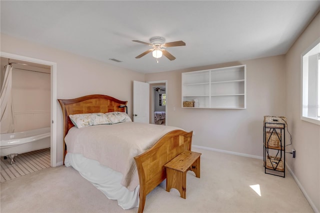 bedroom with carpet floors, baseboards, visible vents, and ceiling fan