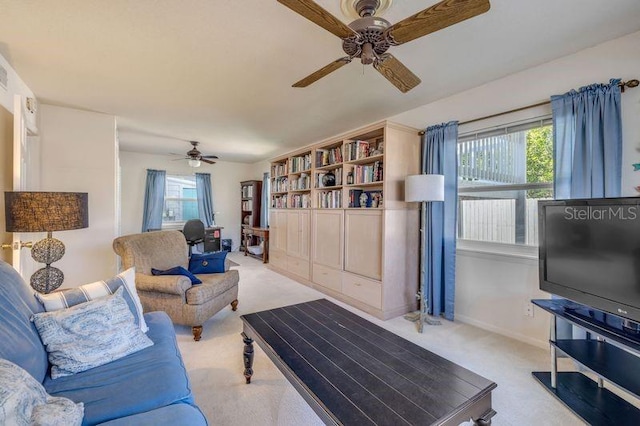 living area with carpet and baseboards