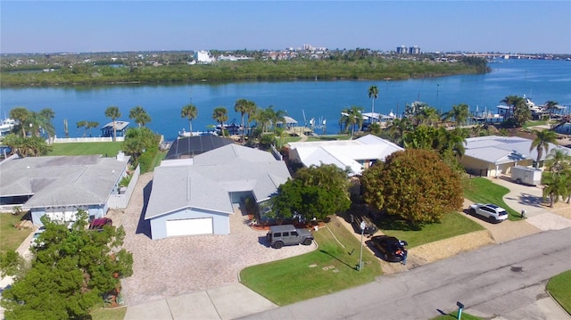 aerial view with a water view and a residential view