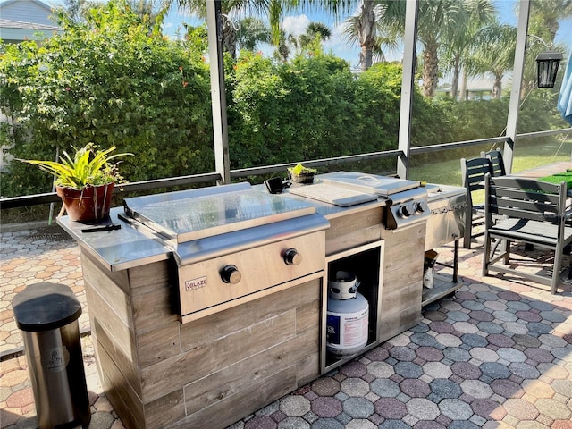 view of patio with exterior kitchen