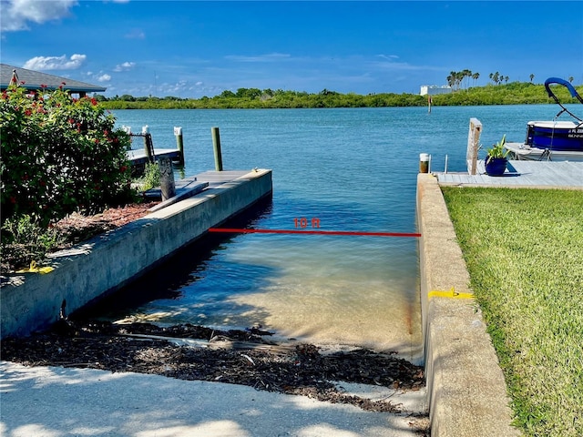 view of dock with a water view