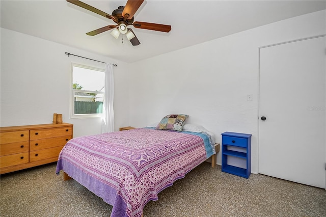 bedroom featuring ceiling fan