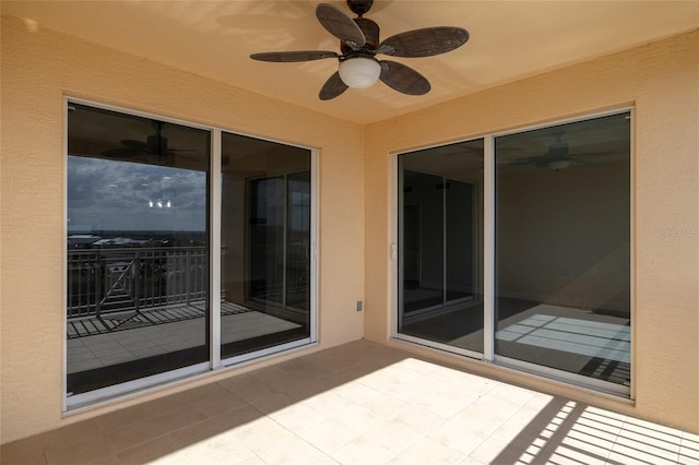 view of patio with ceiling fan