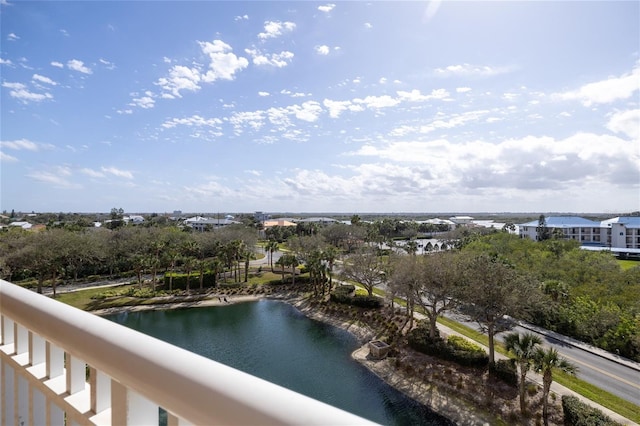 balcony featuring a water view