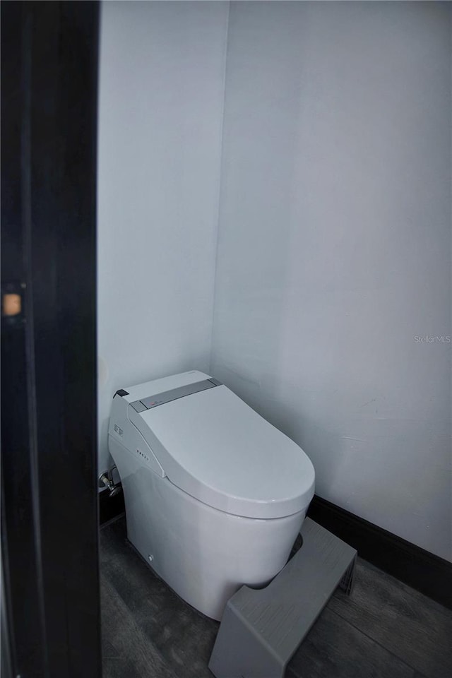 bathroom featuring toilet