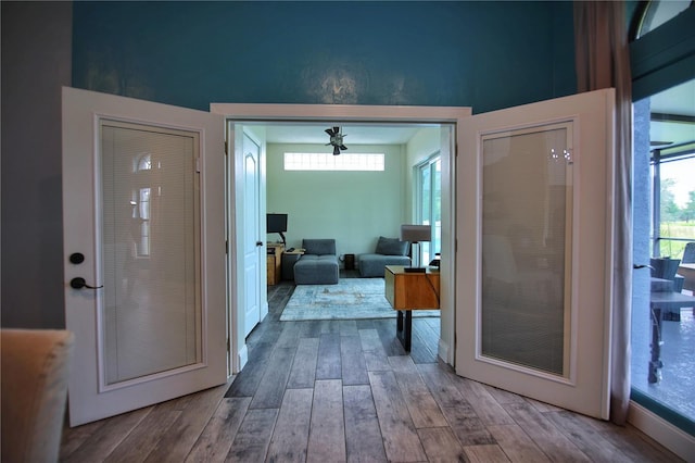 doorway with wood finished floors