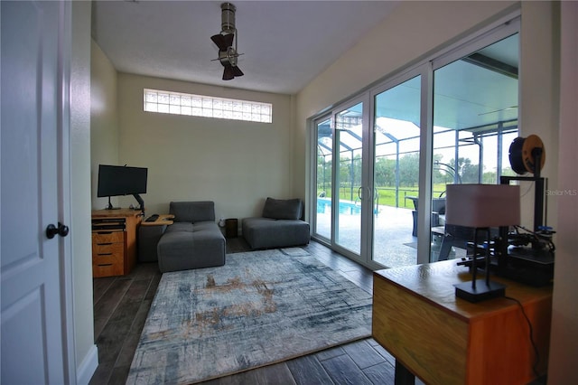 interior space featuring wood finish floors, plenty of natural light, and a sunroom