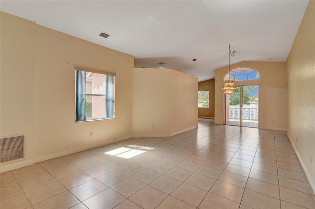 spare room with visible vents, plenty of natural light, and light tile patterned flooring