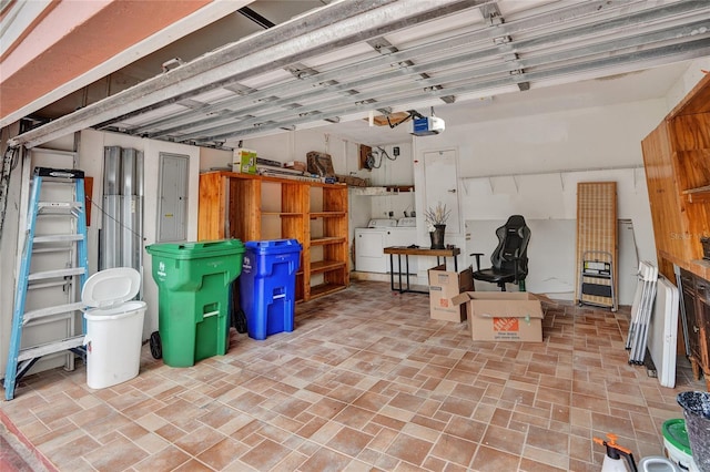 interior space with a garage and washer / clothes dryer