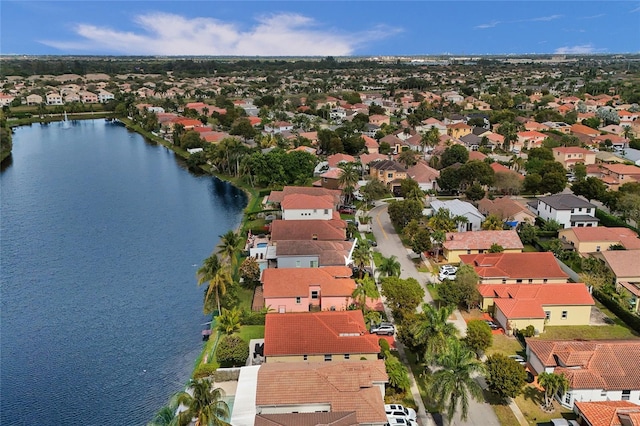 bird's eye view with a water view and a residential view