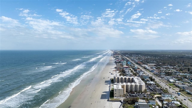 aerial view featuring a beach view and a water view