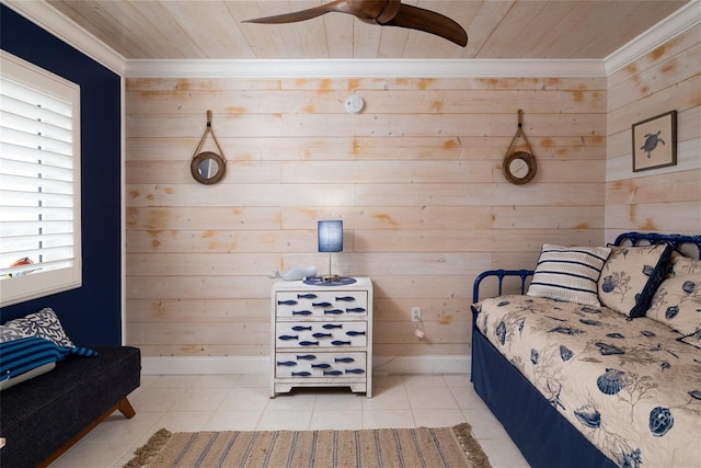 bedroom featuring wood ceiling, baseboards, and light tile patterned floors