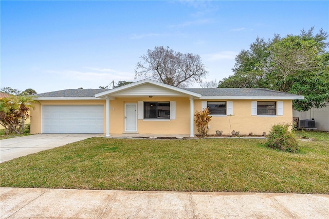 ranch-style house with stucco siding, concrete driveway, central AC, a garage, and a front lawn