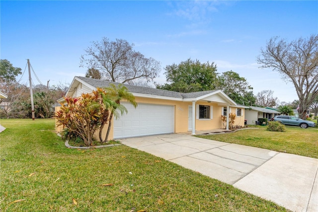 single story home with driveway, a front lawn, an attached garage, and stucco siding