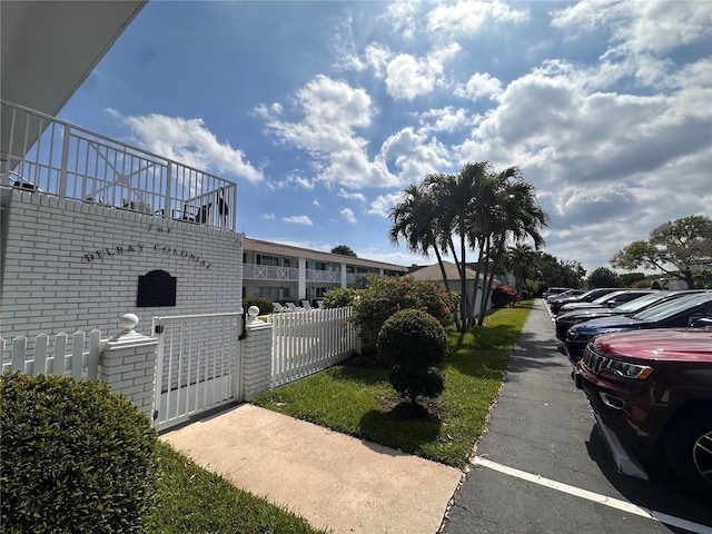 exterior space featuring a gate and fence