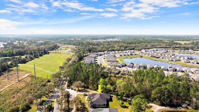 birds eye view of property featuring a residential view and a water view