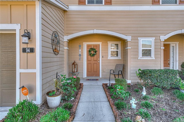 doorway to property featuring a garage