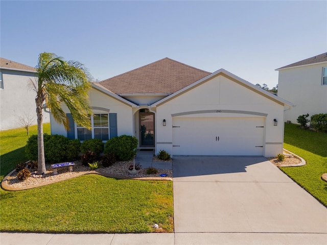 ranch-style house featuring driveway, an attached garage, a front lawn, and stucco siding