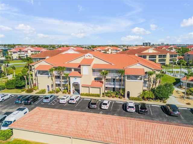 407 Bouchelle Dr Unit 205, New Smyrna Beach, FL 32169 - drone / aerial view with a residential view