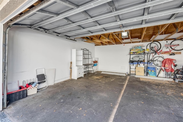 407 Bouchelle Dr Unit 205, New Smyrna Beach, FL 32169 - garage with a garage door opener