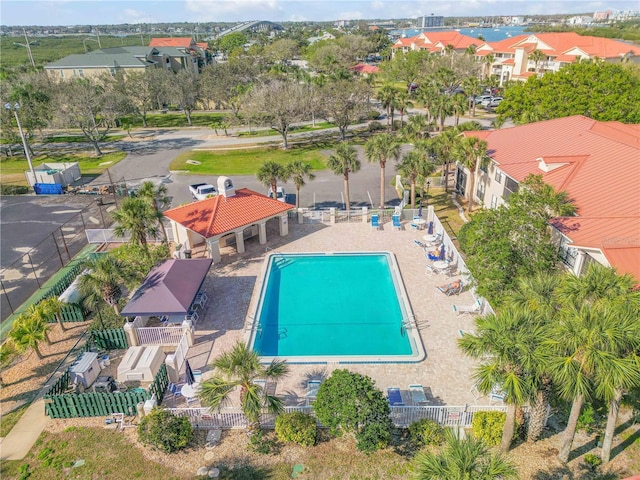 407 Bouchelle Dr Unit 205, New Smyrna Beach, FL 32169 - pool featuring a residential view and fence
