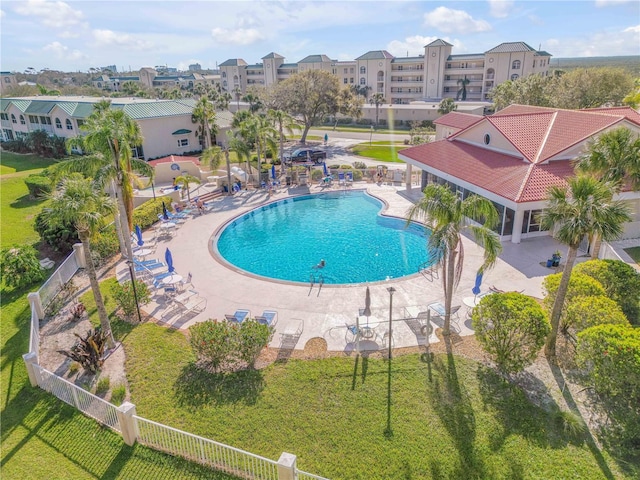 407 Bouchelle Dr Unit 205, New Smyrna Beach, FL 32169 - pool featuring a patio, a yard, and fence
