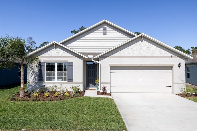 single story home featuring a garage, a front yard, and driveway