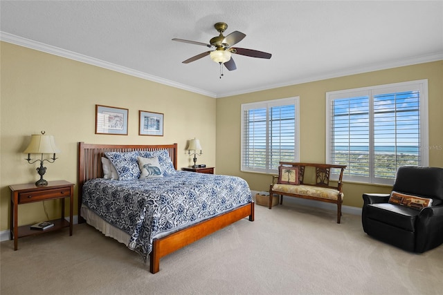 bedroom with ceiling fan, baseboards, light colored carpet, and ornamental molding