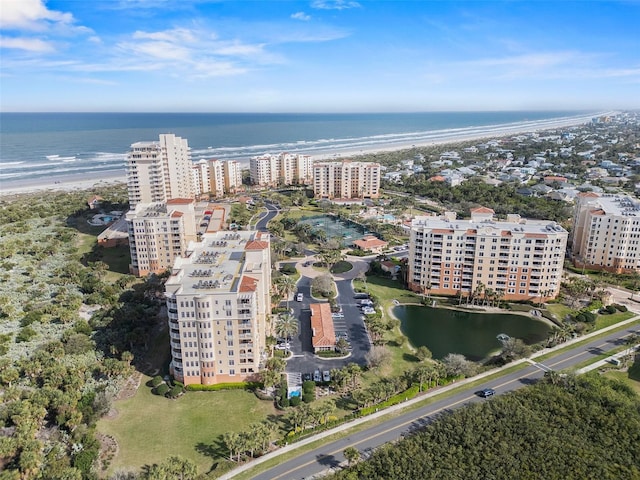 aerial view featuring a view of city and a water view