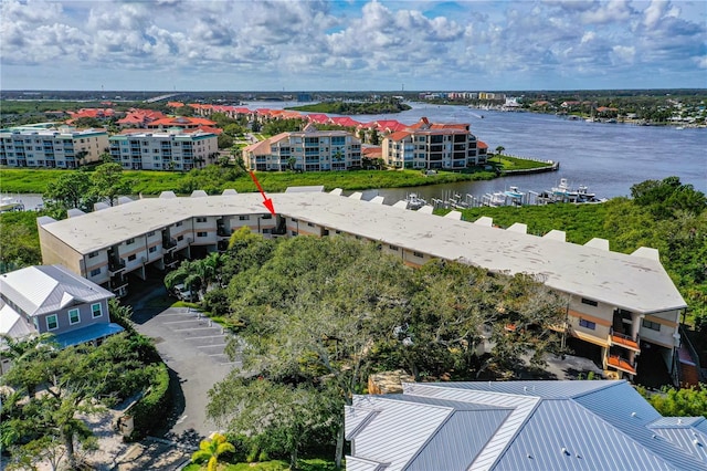 drone / aerial view with a water view