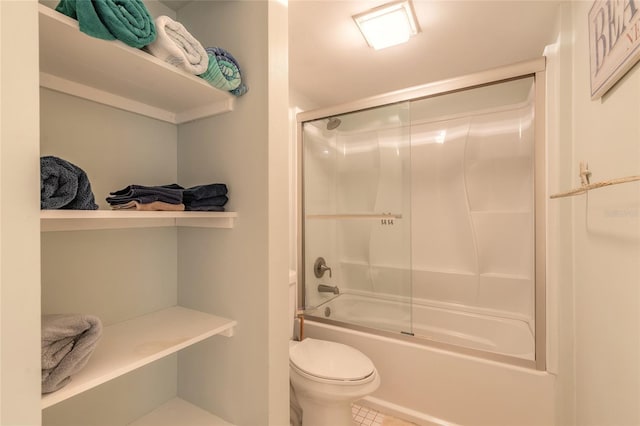 bathroom with toilet, tile patterned flooring, and enclosed tub / shower combo