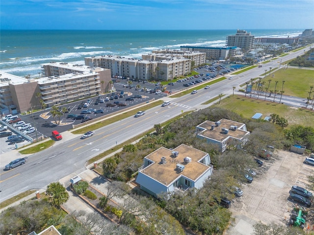 bird's eye view featuring a water view and a city view