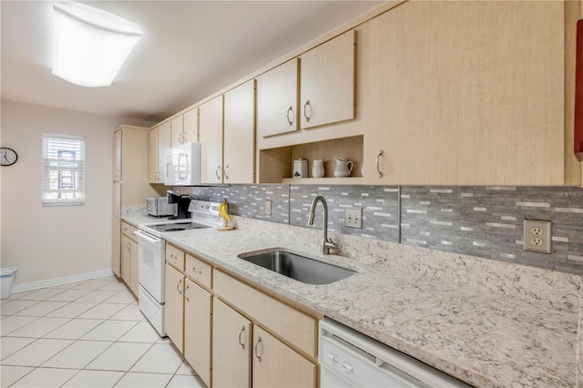 kitchen featuring light tile patterned flooring, white appliances, a sink, open shelves, and tasteful backsplash