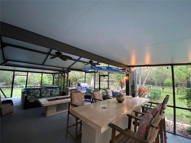 sunroom / solarium with ceiling fan