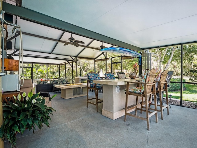 1370 Jane Lacey Ln, New Smyrna Beach, FL 32168 - sunroom / solarium featuring a ceiling fan, outdoor lounge area, and plenty of natural light