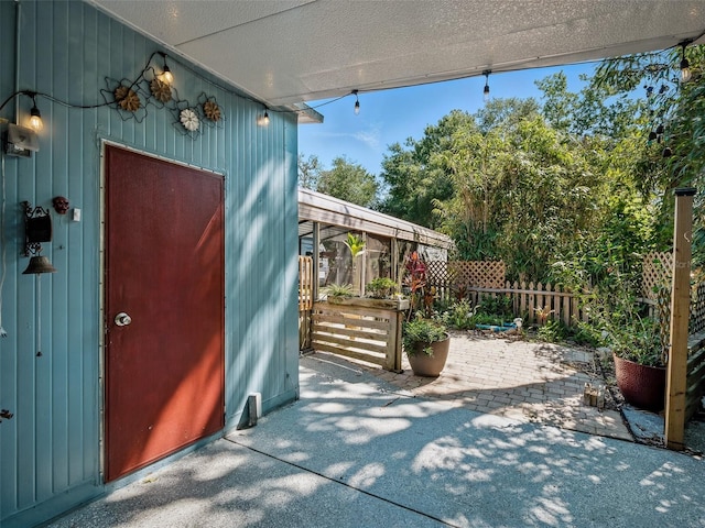 1370 Jane Lacey Ln, New Smyrna Beach, FL 32168 - property entrance with a patio